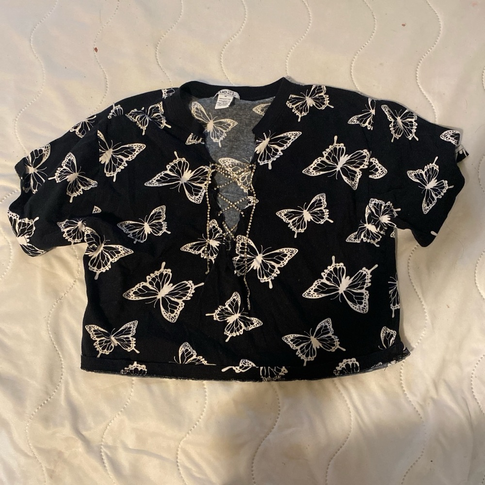 Rue21 butterfly crop top. Low v neck sequence crisscross.
